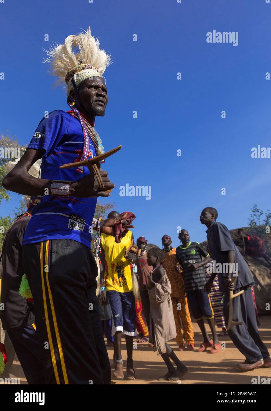 Larim tribe men dancing during a wedding ceremony, Boya Mountains, Imatong, South Sudan Stock Photo
