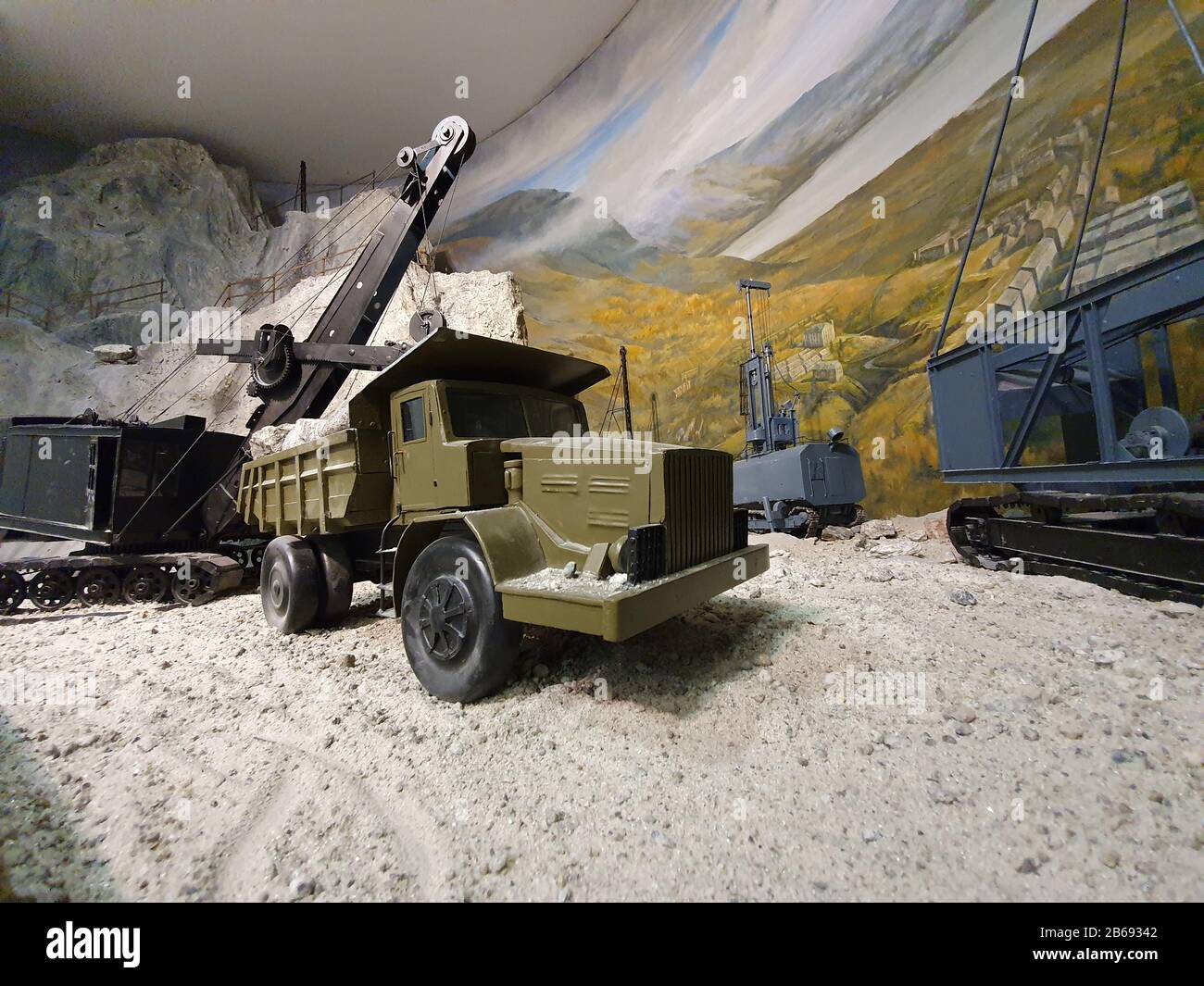 Model of equipment for the transportation of rocks. Large trucks are used in the mining industry. Stock Photo