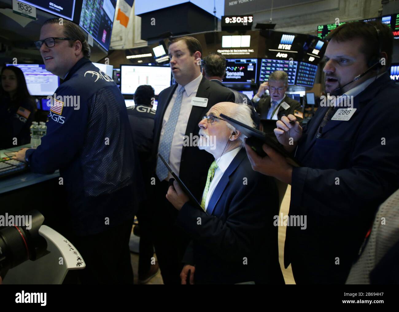 New York, United States. 10th Mar, 2020. Traders work on the the floor of the New York Stock Exchange at the opening bell on Wall Street in New York City on Tuesday, March 10, 2020. Wall Street began the day by recovering some of the massive losses on the Monday session where the DOW closed down over 2000 points. Photo by John Angelillo/UPI Credit: UPI/Alamy Live News Stock Photo