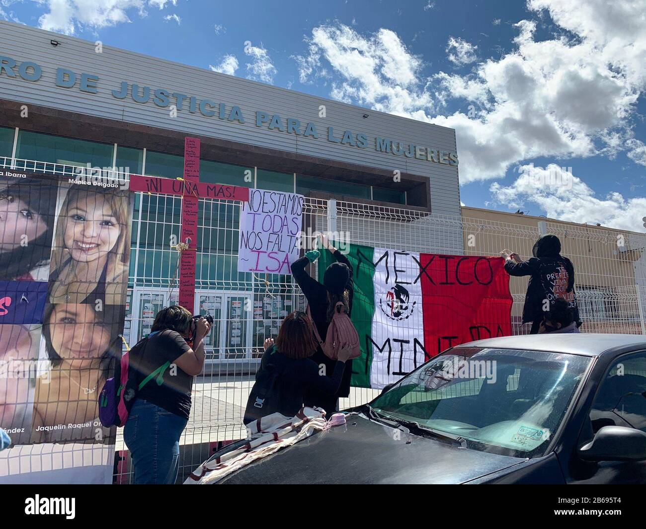 USA. 09th Mar, 2020. Protesters hang signs outside the Center for Justice for Women in Juarez before a demonstration Monday, March 9, 2020, against femicides. Isabel5 (Photo by Aaron Montes/El Paso Times, El Paso Times via Imagn Content Services, LLC/USA Today Network/Sipa USA) Credit: Sipa USA/Alamy Live News Stock Photo