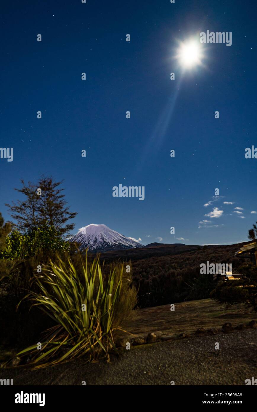 Mount Ngauruhoe in the Tongariro National Park, New Zealand taken at night illuminated by moonlight from the Skotel Alpine Resort Stock Photo