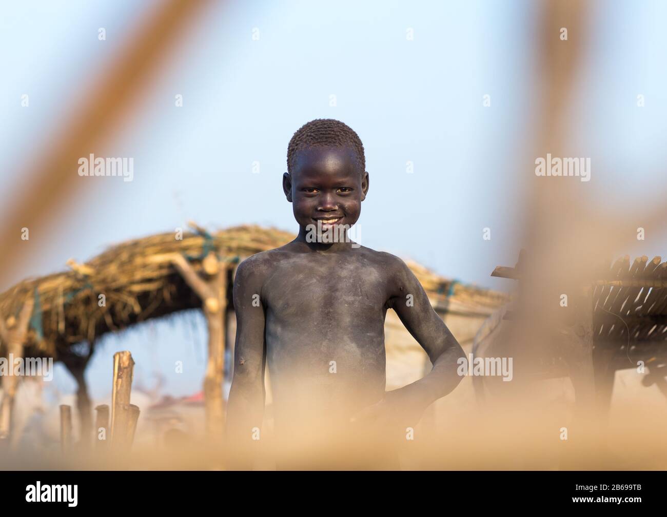 Mundari Smiling Mundari tribe boy in a cattle camp, Central Equatoria, Terekeka ...