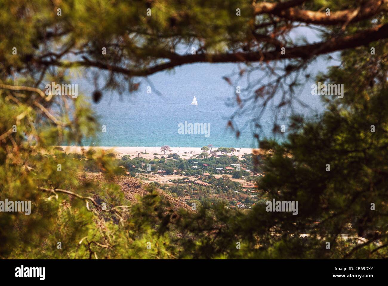 small alone sailboat in the sea Stock Photo