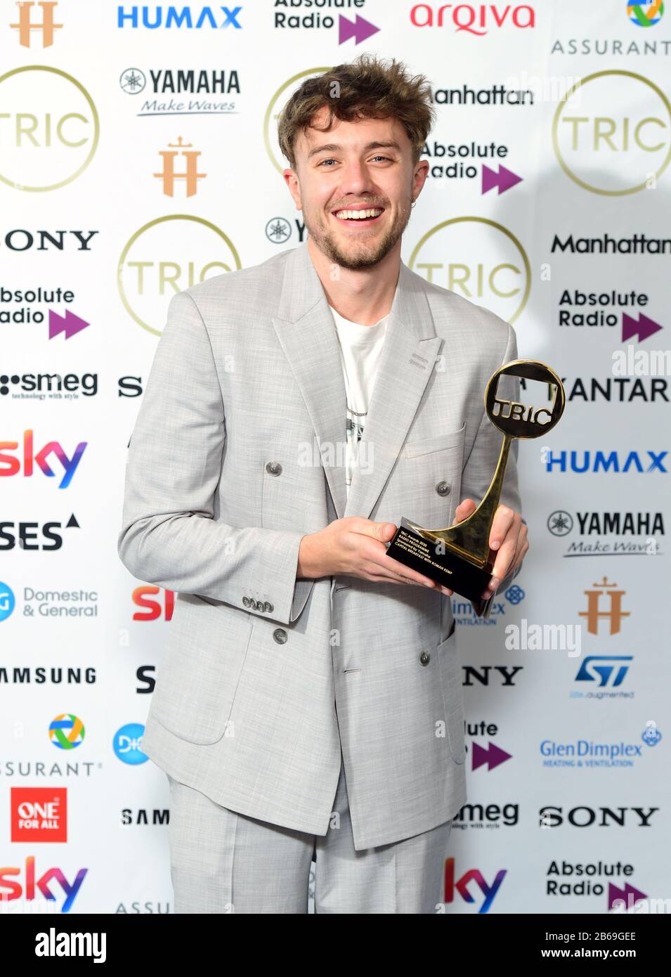 Roman Kemp with the Radio Programme Award Sponsored by Yamaha at the TRIC Awards  2020 held at the Grosvenor Hotel, London Stock Photo - Alamy