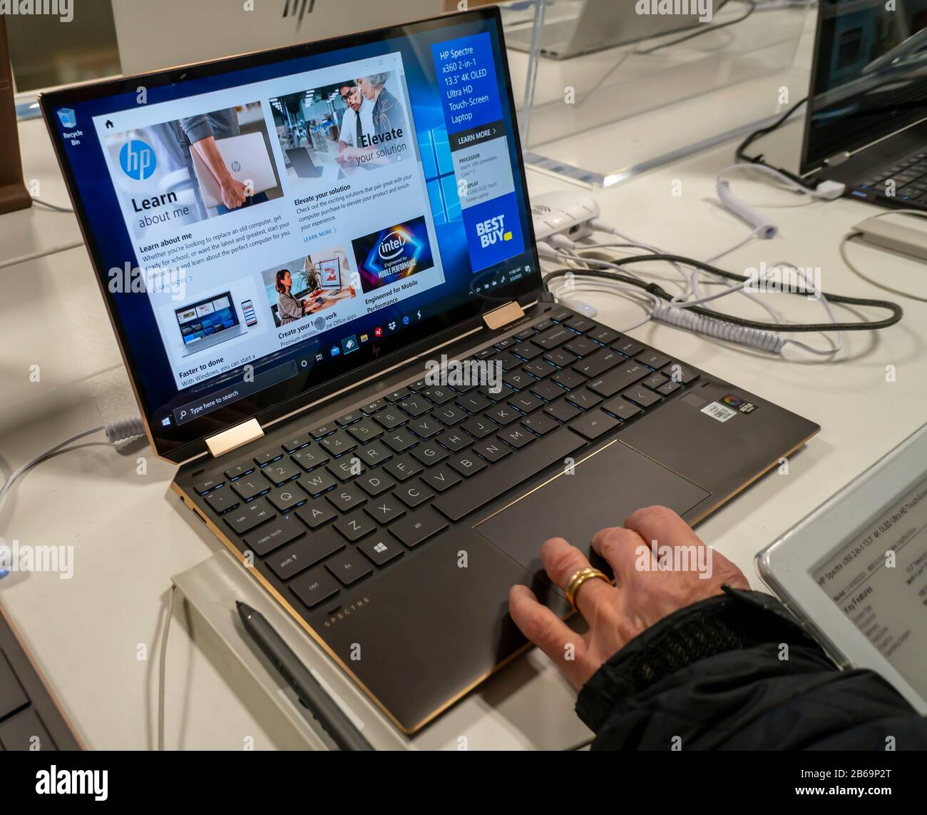 Shopping for laptops at best buy store hires stock photography and