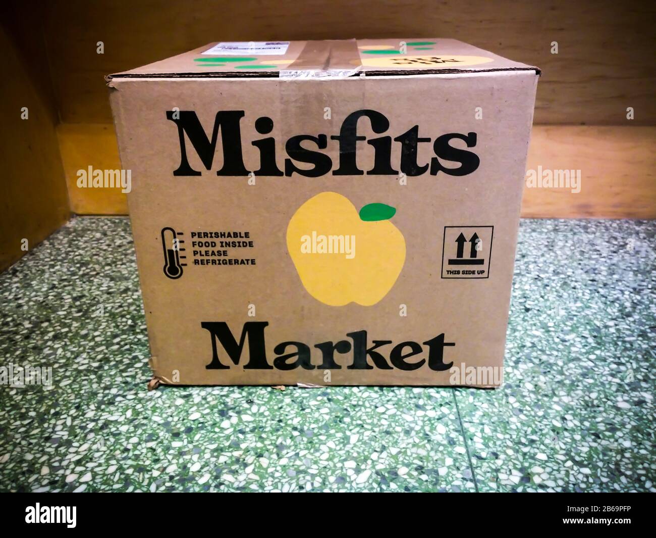 A delivery from Misfits in the lobby of apartment building in the Chelsea neighborhood of New York on Wednesday, March 4, 2020. Misfits is a food subscription service selling fruits and vegetables deemed too damaged or aesthetically unappealing by conventional distributors. (© Richard B. Levine) Stock Photo