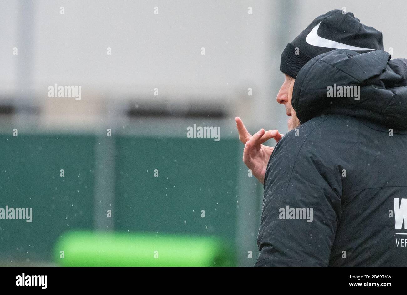 10 March 2020, Bavaria, Augsburg: Heiko Herrlich whistles on his fingers. Herrlich led his first training session at the Bundesliga football club FC Augsburg as the new head coach. Photo: Stefan Puchner/dpa Stock Photo