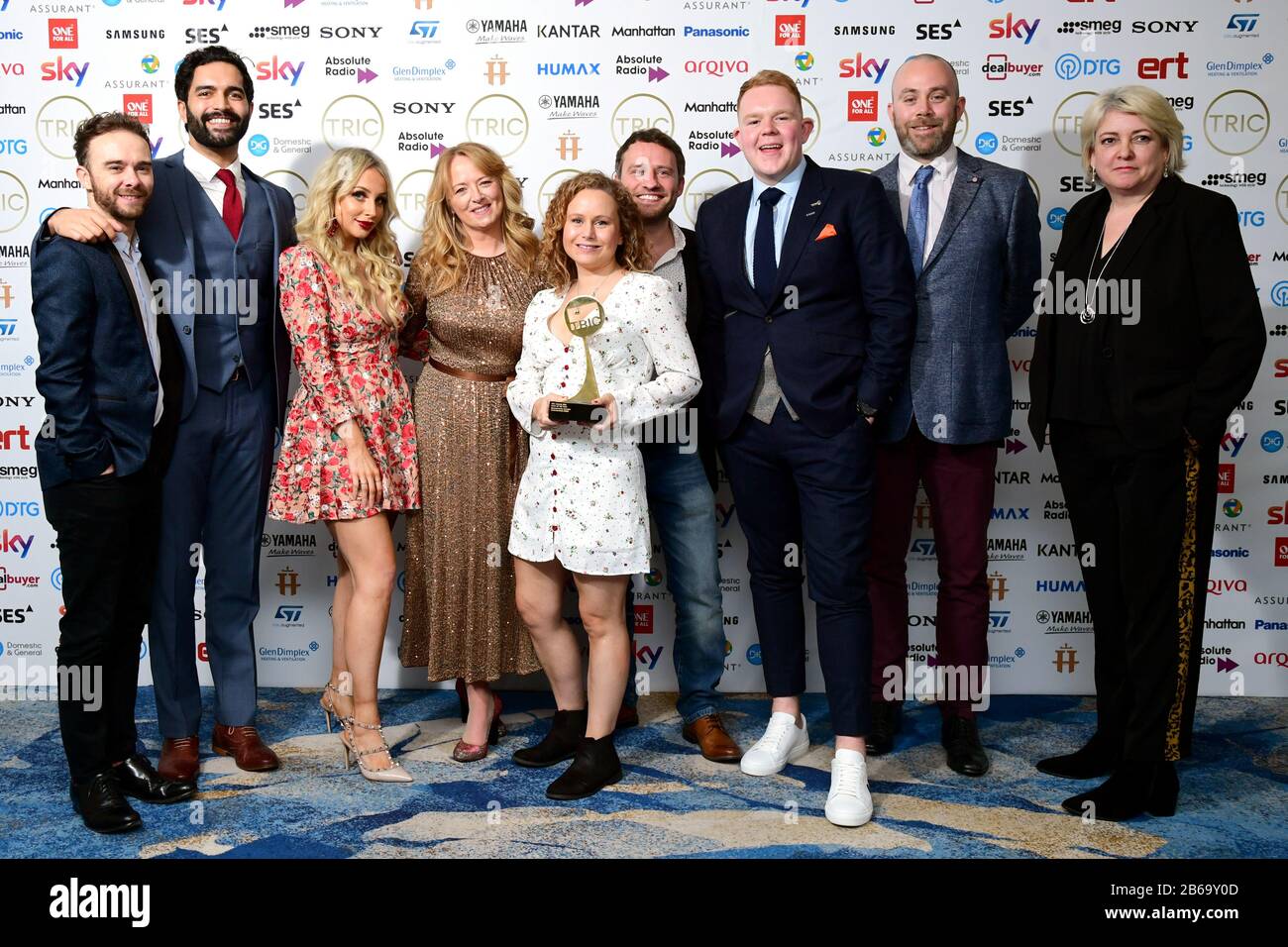 The cast of Coronation Street with the award for Soap of the Year Sponsored by Assurant. Jack P. Shepherd, Charlie De Melo, Sally Ann Matthews, Dolly-Rose Campbell, Peter Ash, and Colson Smith attending the TRIC Awards 2020 held at the Grosvenor Hotel, London. Stock Photo