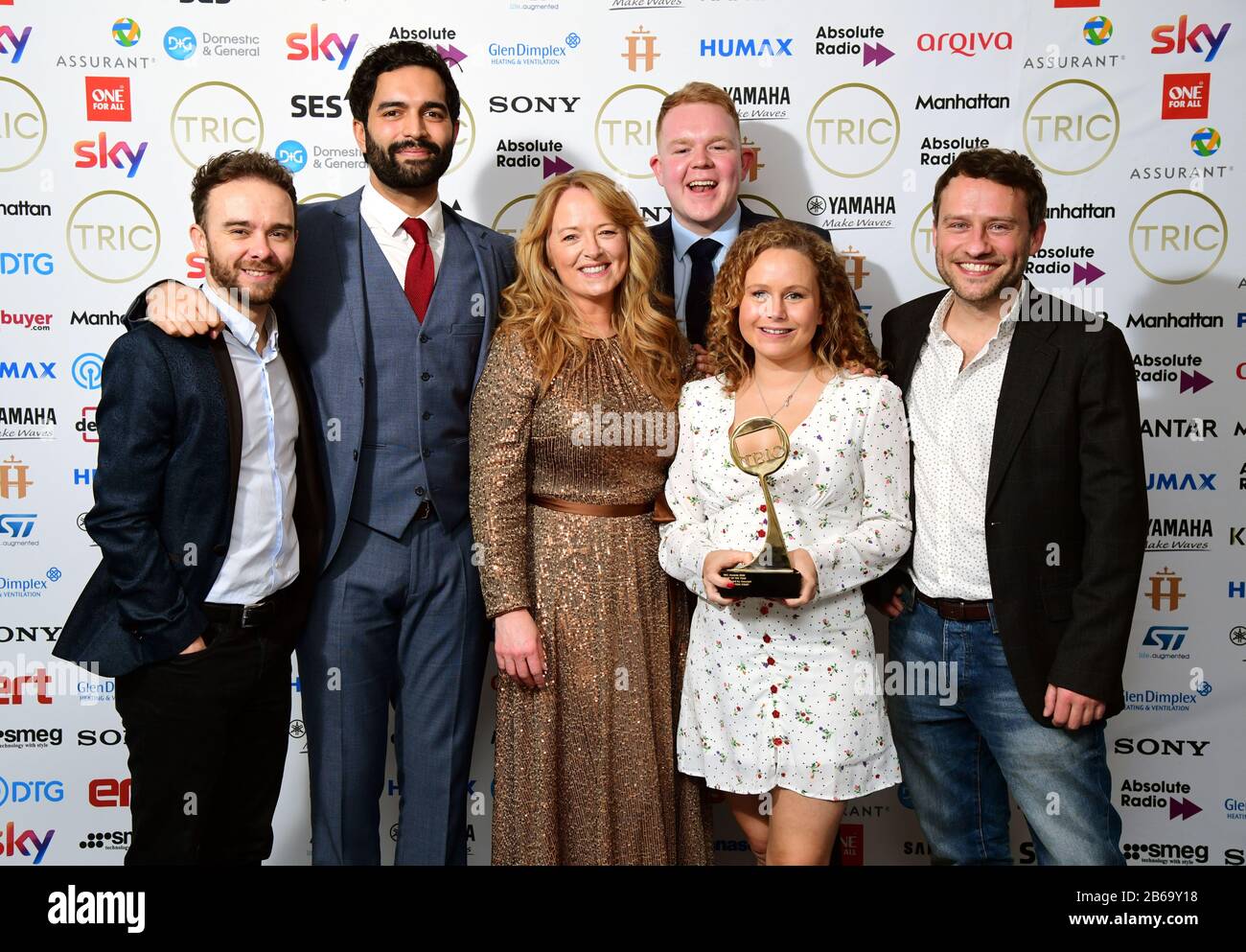 The cast of Coronation Street with the award for Soap of the Year Sponsored by Assurant. Jack P. Shepherd, Charlie De Melo, Sally Ann Matthews, Dolly-Rose Campbell, Colson Smith and Peter Ash (left to right) attending the TRIC Awards 2020 held at the Grosvenor Hotel, London. Stock Photo