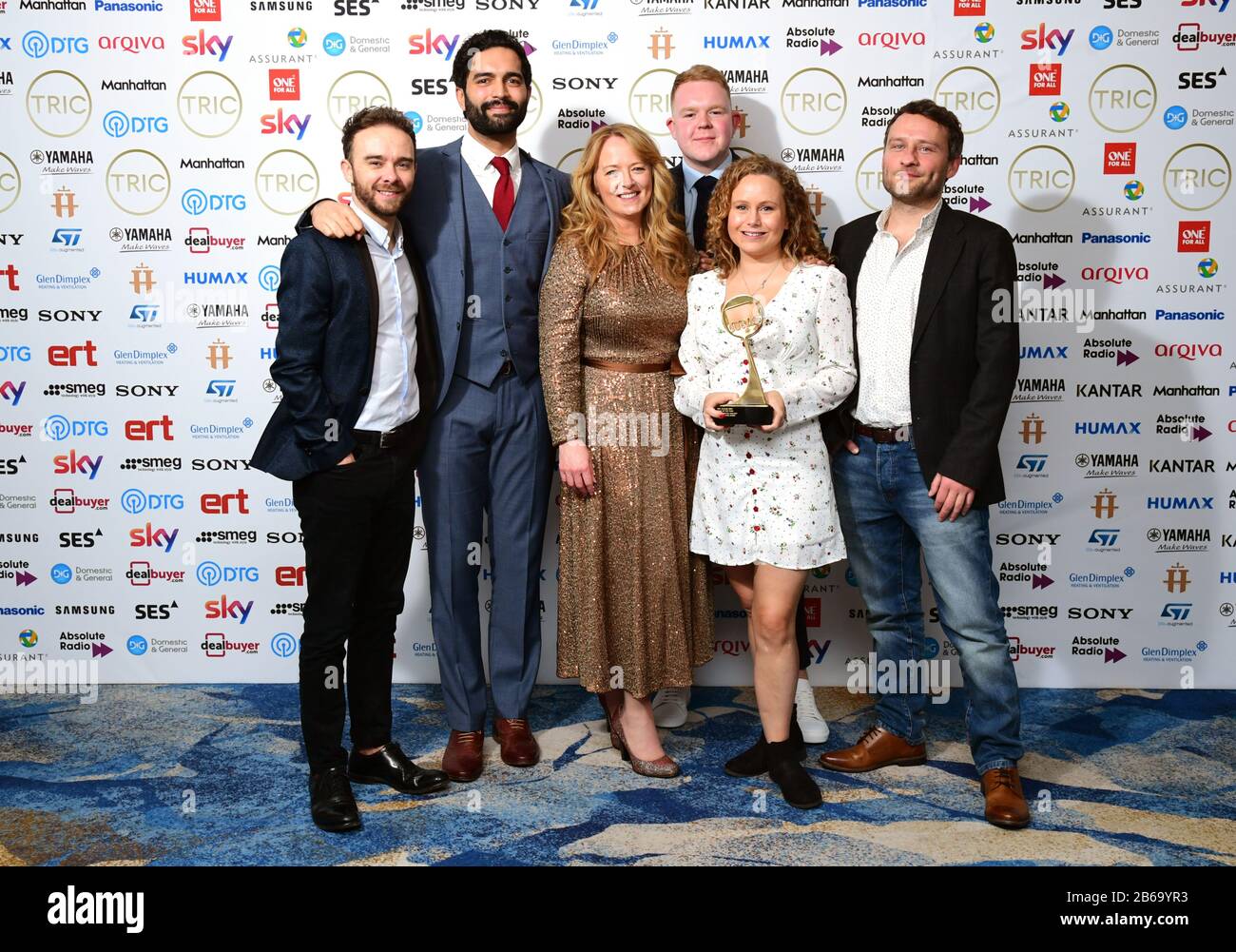 The cast of Coronation Street with the award for Soap of the Year Sponsored by Assurant. Jack P. Shepherd, Charlie De Melo, Sally Ann Matthews, Dolly-Rose Campbell, Colson Smith and Peter Ash (left to right) attending the TRIC Awards 2020 held at the Grosvenor Hotel, London. Stock Photo