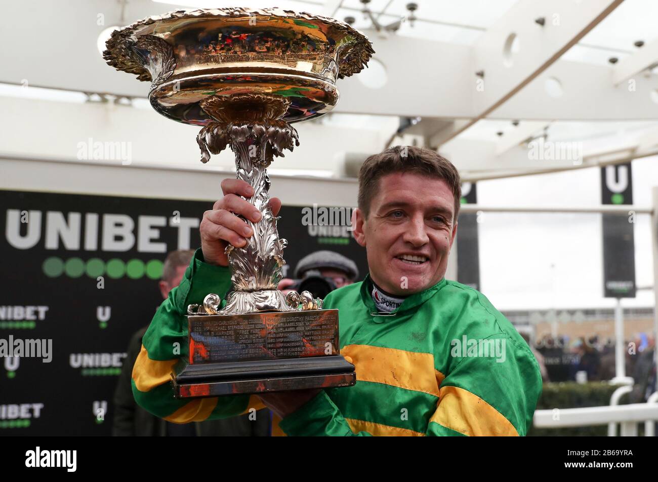 Winning Jockey of of Epatante, Barry Geraghty following victory in the Unibet Champion Hurdle Challenge Trophy on day one of the Cheltenham Festival at Cheltenham Racecourse, Cheltenham. Stock Photo