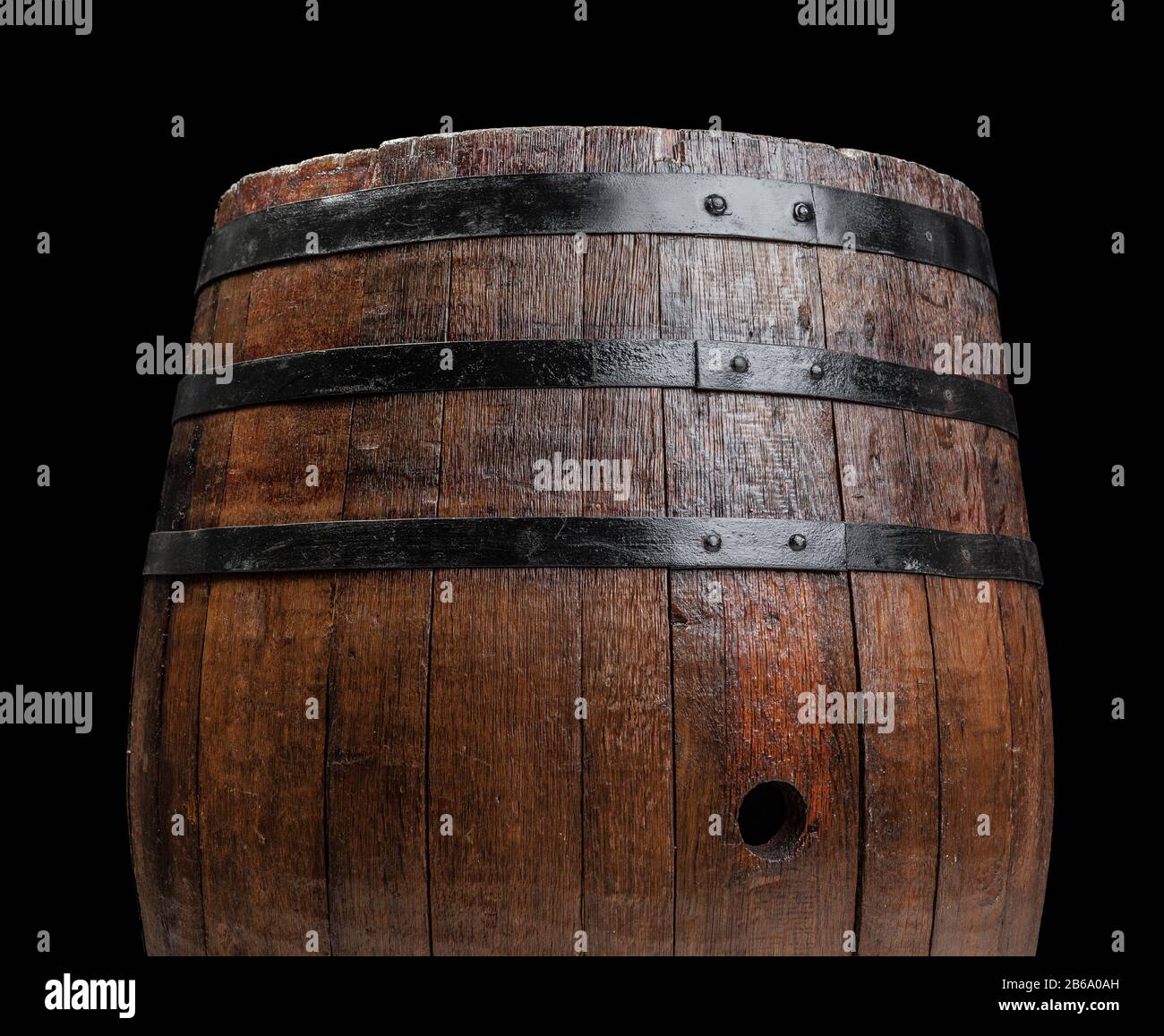 Old wooden barrel on a dark background Stock Photo - Alamy