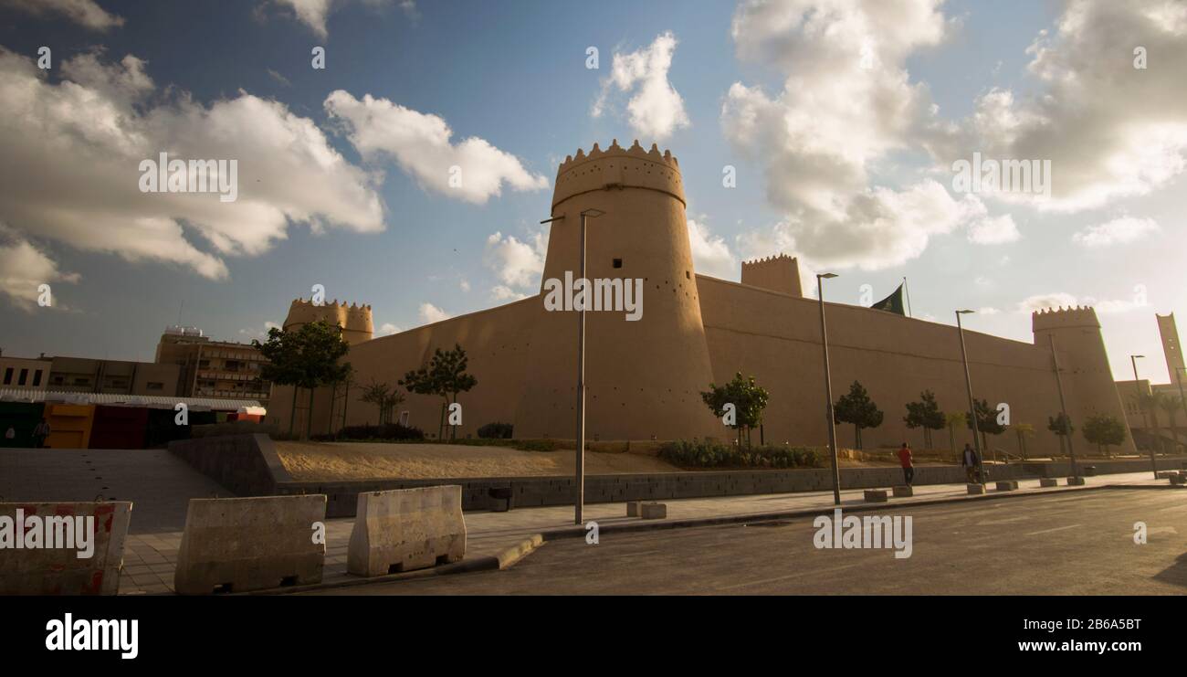 Asia, almasmak, Riyadh, Saudi Arabia February 2, 2019 almasmak Saudi Arabian historical building with Saudi flag waving Stock Photo