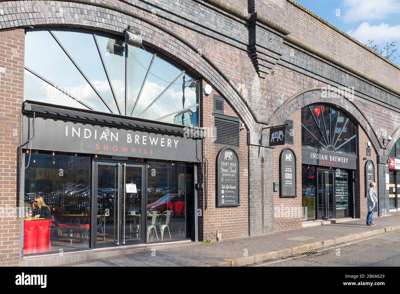 The Indian Brewery in railway arches on Livery Street in Birmingham City Centre, UK serves indian street food and craft beer Stock Photo