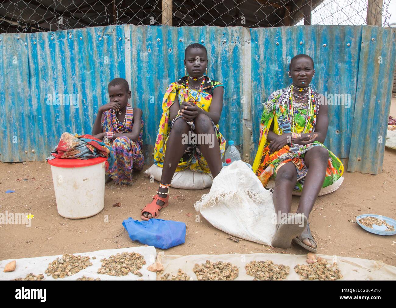 Toposa tribe women in traditional clothing in a market, Namorunyang State, Kapoeta, South Sudan Stock Photo