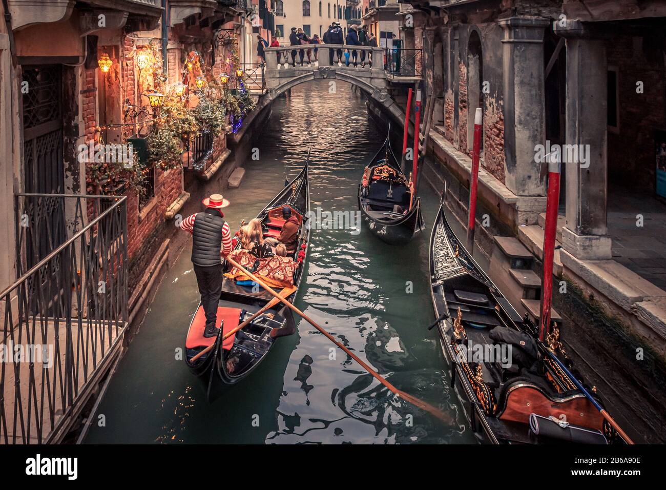 Goldolier Christmas Harrogate 2022 Gondolier Rowing Down A Narrow Canal In Venice, Italy With Christmas Lights  Illuminating His Gondola And A Small Bridge In The Background Stock Photo -  Alamy
