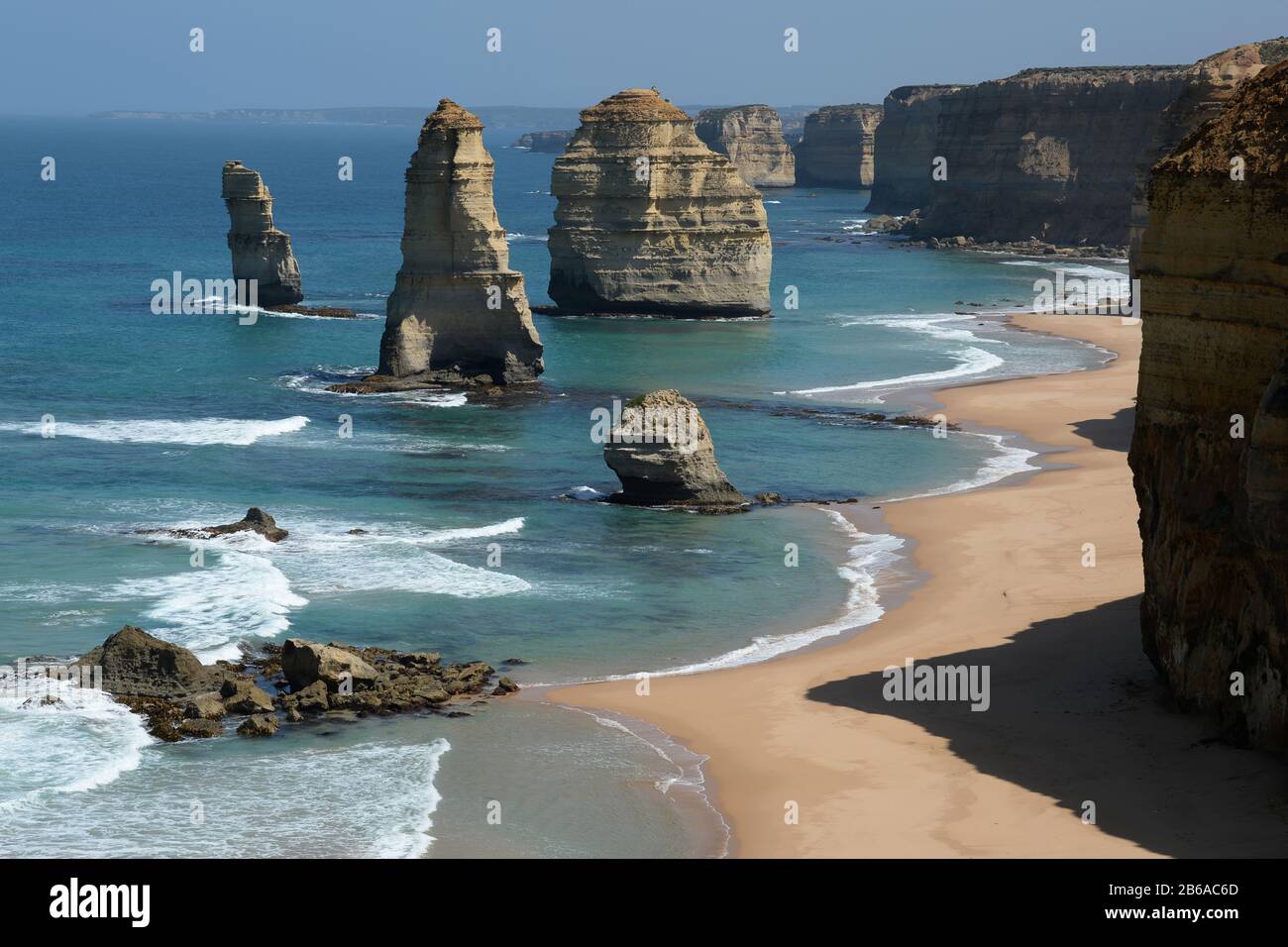 The Twelve Apostles are one of the world's most distinctive rock formations located on the Great Ocean Road, Victoria, Australia. Stock Photo