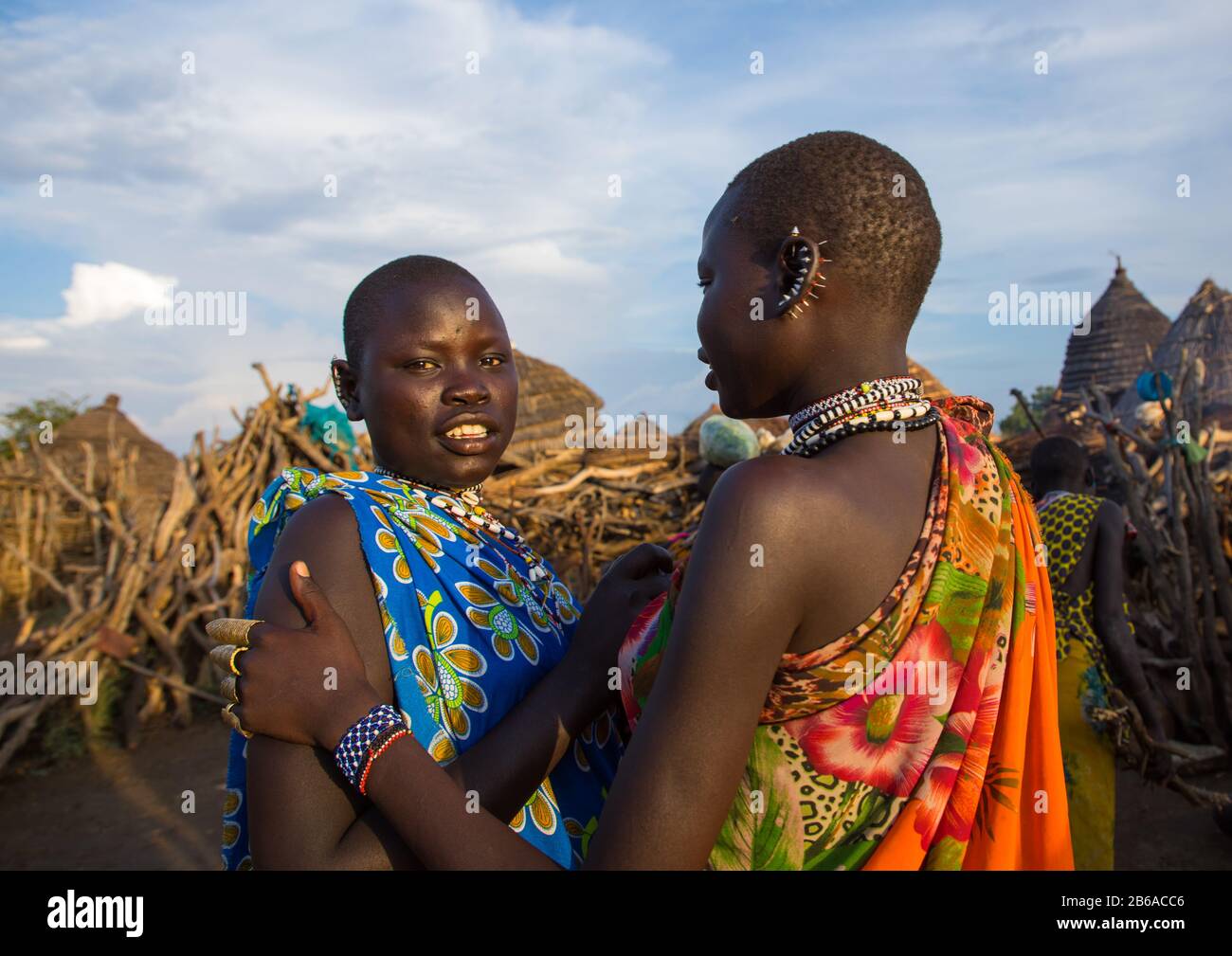 Toposa tribe young women in traditional clothing, Namorunyang State, Kapoeta, South Sudan Stock Photo