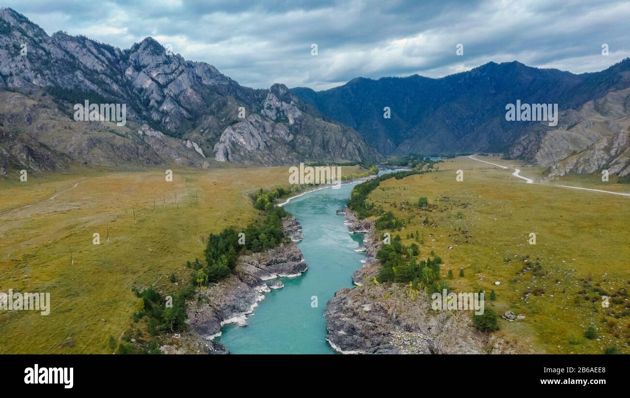 Mountain turquoise river, rocky banks aerial view. Rugged Rea for Rafting Drone shooting. Katun River, Altai. Stock Photo