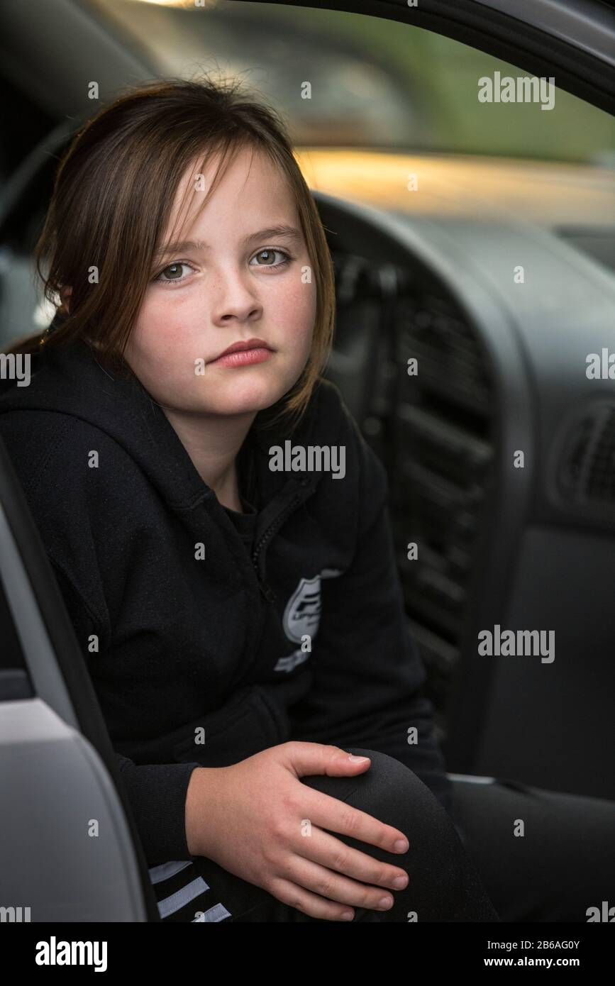 Portrait of a 10 year old girl in a car Stock Photo