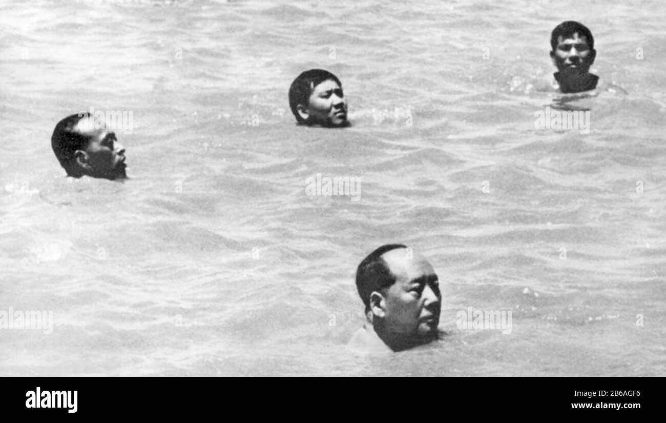 MAO ZEDONG - Chairman Mao - (1893-1976) Chinese Communist leader taking a dip in the Yangtze River on 16 July 1966 aged 72 surrounded by his bodyguards. Stock Photo