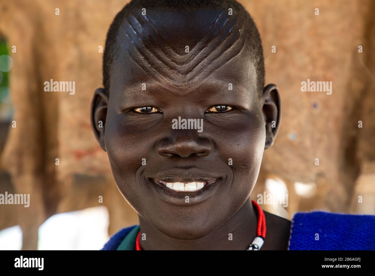Portrait of a Mundari tribe woman with scarifications on the forehead, Central Equatoria, Terekeka, South Sudan Stock Photo