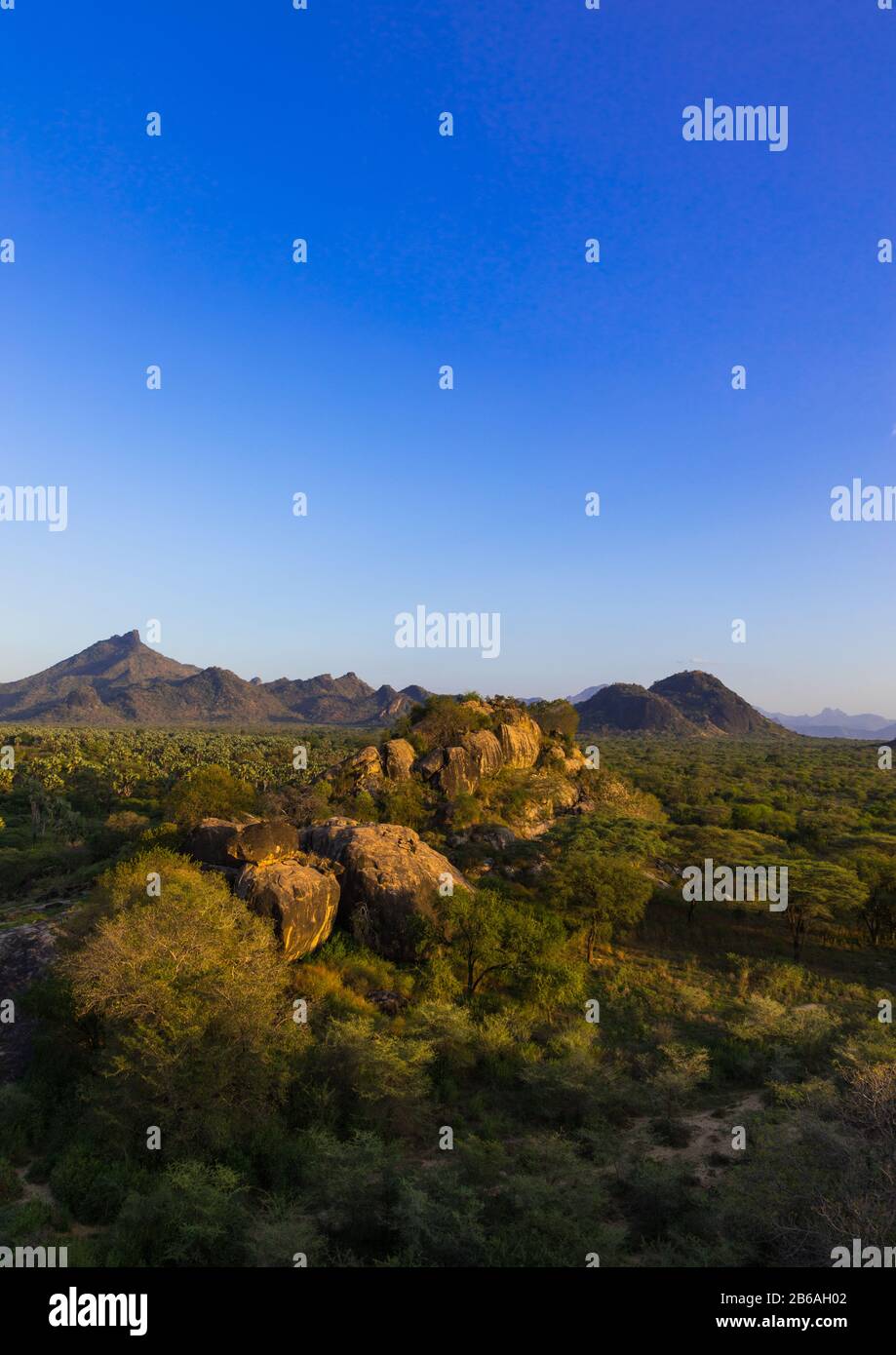 Oasis in front of the Boya mountains, Boya Mountains, Imatong, South Sudan Stock Photo