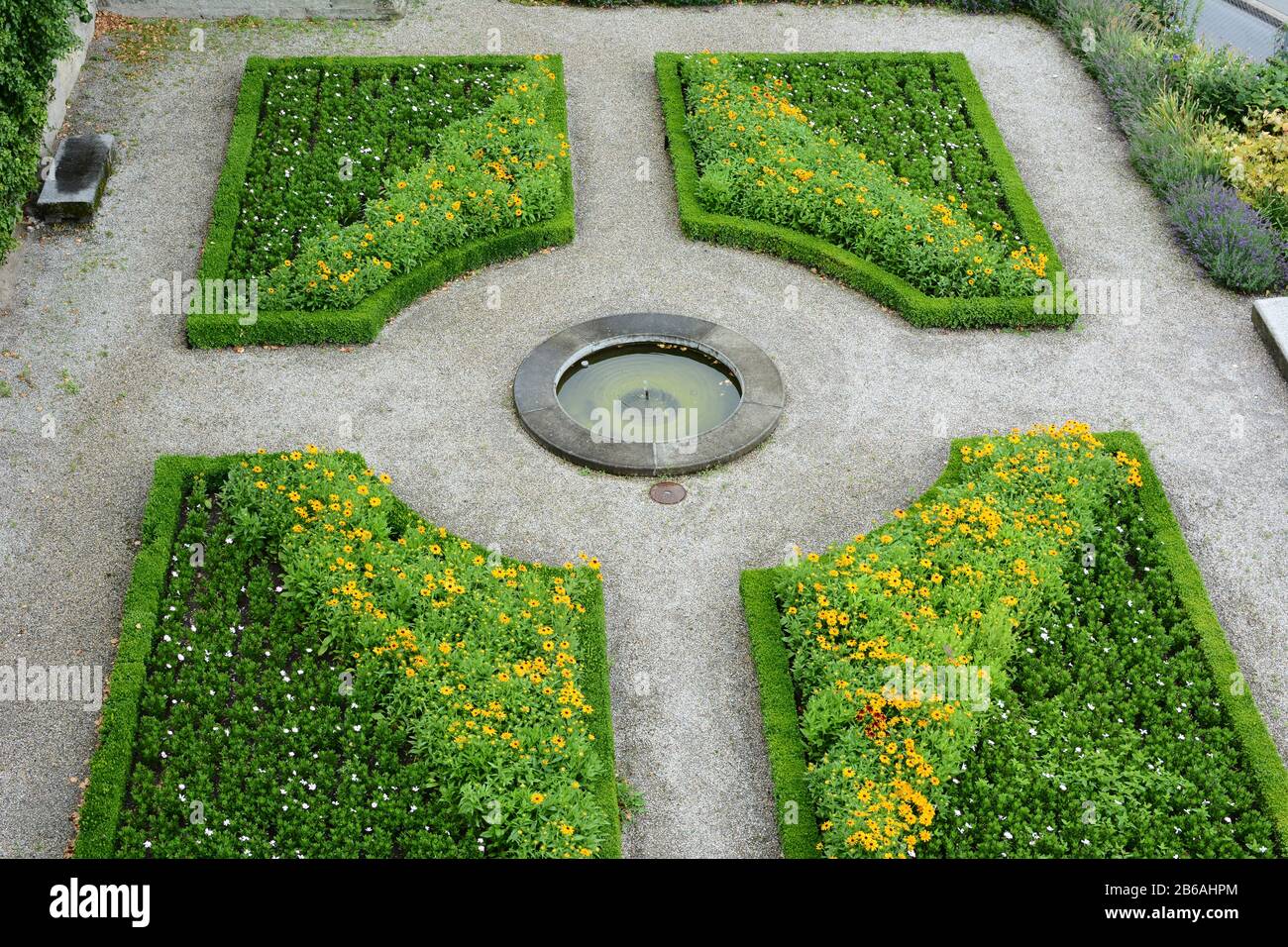 LAUSANNE, SWITZERLAND - JULY 7, 2014: Gardens at the Cathedral of Notre Dame of Lausanne. The church belongs to the Evangelical Reformed Church of the Stock Photo