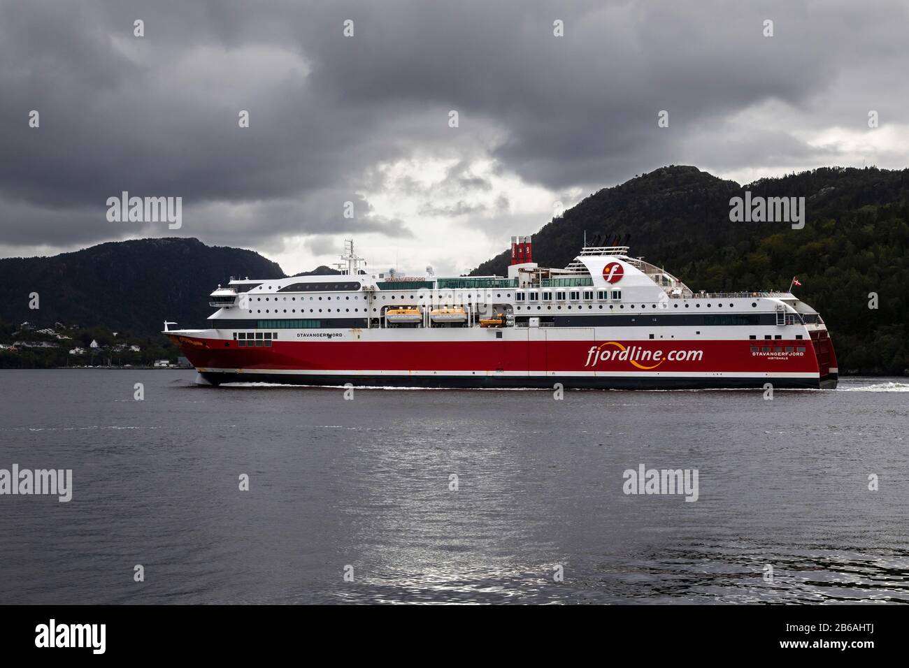 Ro-ro / passenger ship Stavangerfjord arriving near the port of Bergen, Norway. Passing Laksevaag. Stock Photo