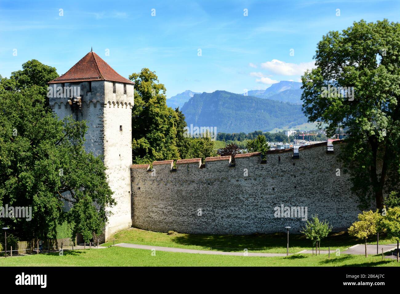 LUCERNE, SWITZERLAND - JULY 3, 2014: The Musegg Wall and Schirmer Tower, Lucerne. With nine guard towers, the old city walls were built between 1350-1 Stock Photo