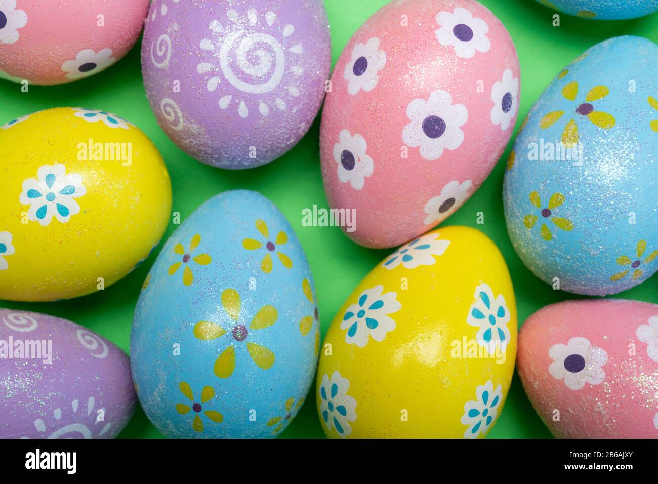 Painted Easter eggs on a colorful background Stock Photo