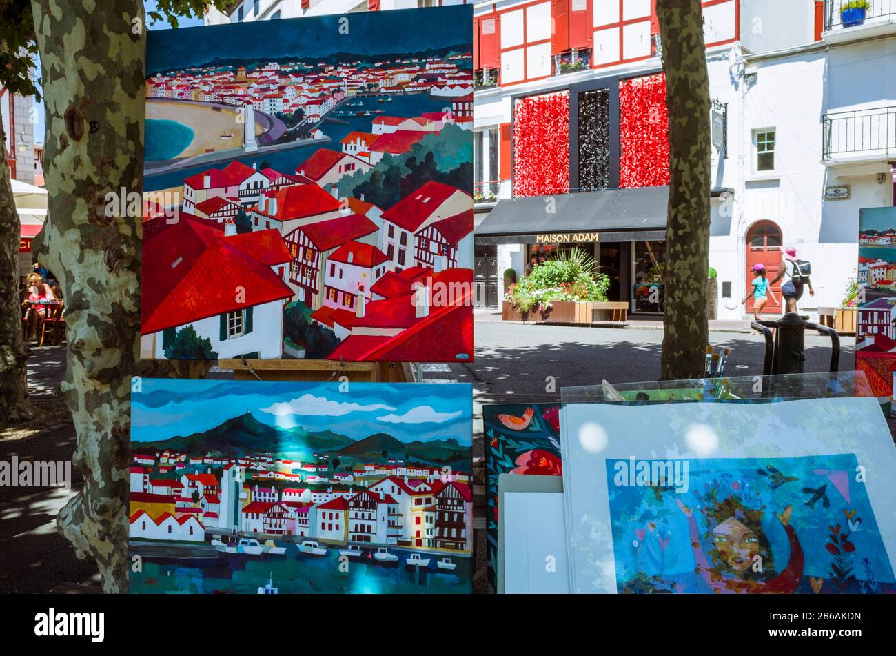 Saint Jean de Luz, French Basque Country, France - July 19th, 2019 : Paintings at the daily artists market in the Place Louis XIV square in the histor Stock Photo