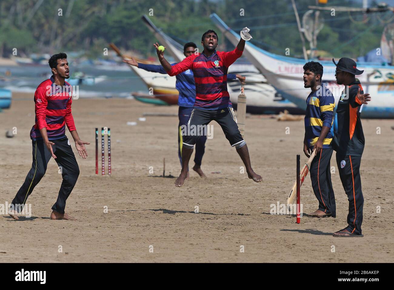 Galle, Sri Lanka. 01st Jan, 2020. Sri Lankan cricket fans play on the beach  prior to the first test match between England and Sri Lanka, Sunday, March  8, 2020, at Galle, Sri