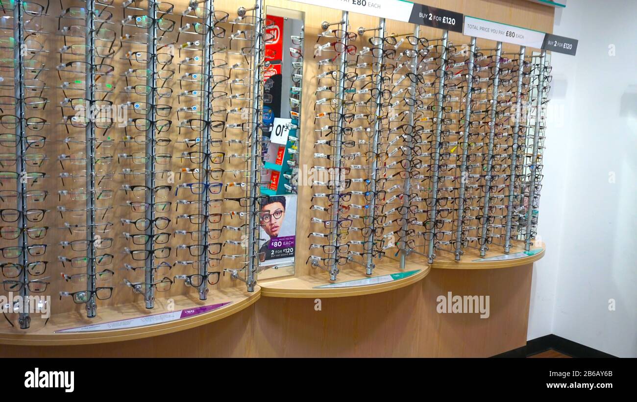Eye glasses displayed in Asda Supermarket looking at eye glasses Stock Photo Alamy