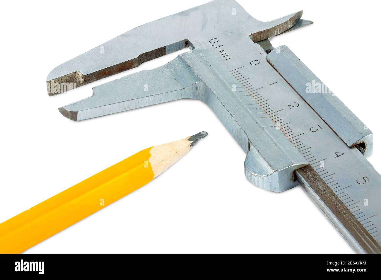 Pencil and vernier caliper close-up on a white background. Stock Photo