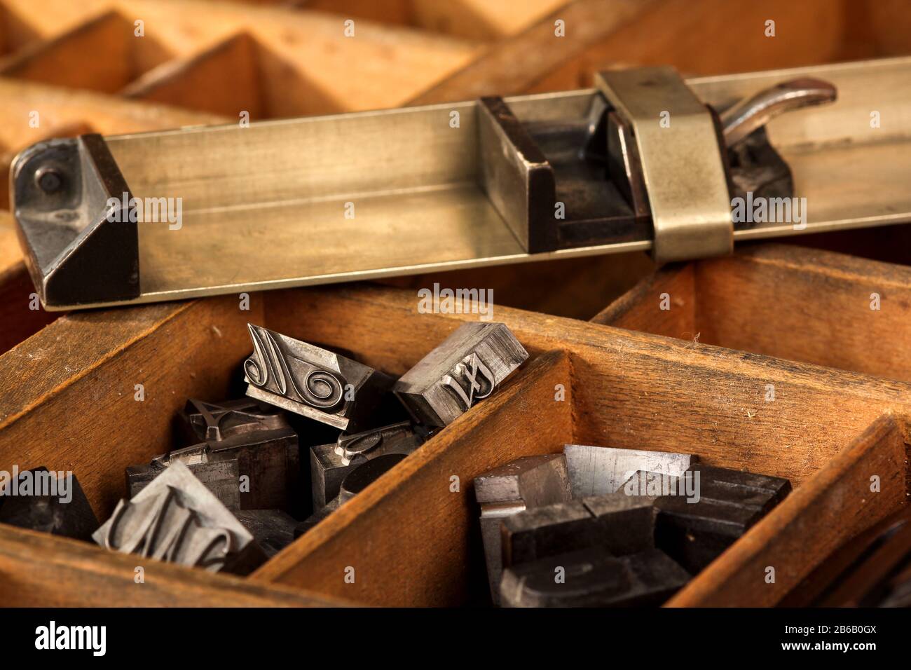 Composing stick on letter case Stock Photo
