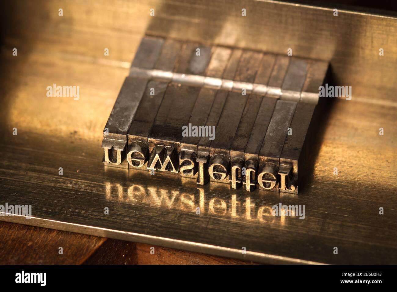 Composing stick with the letters 'newspaper' Stock Photo
