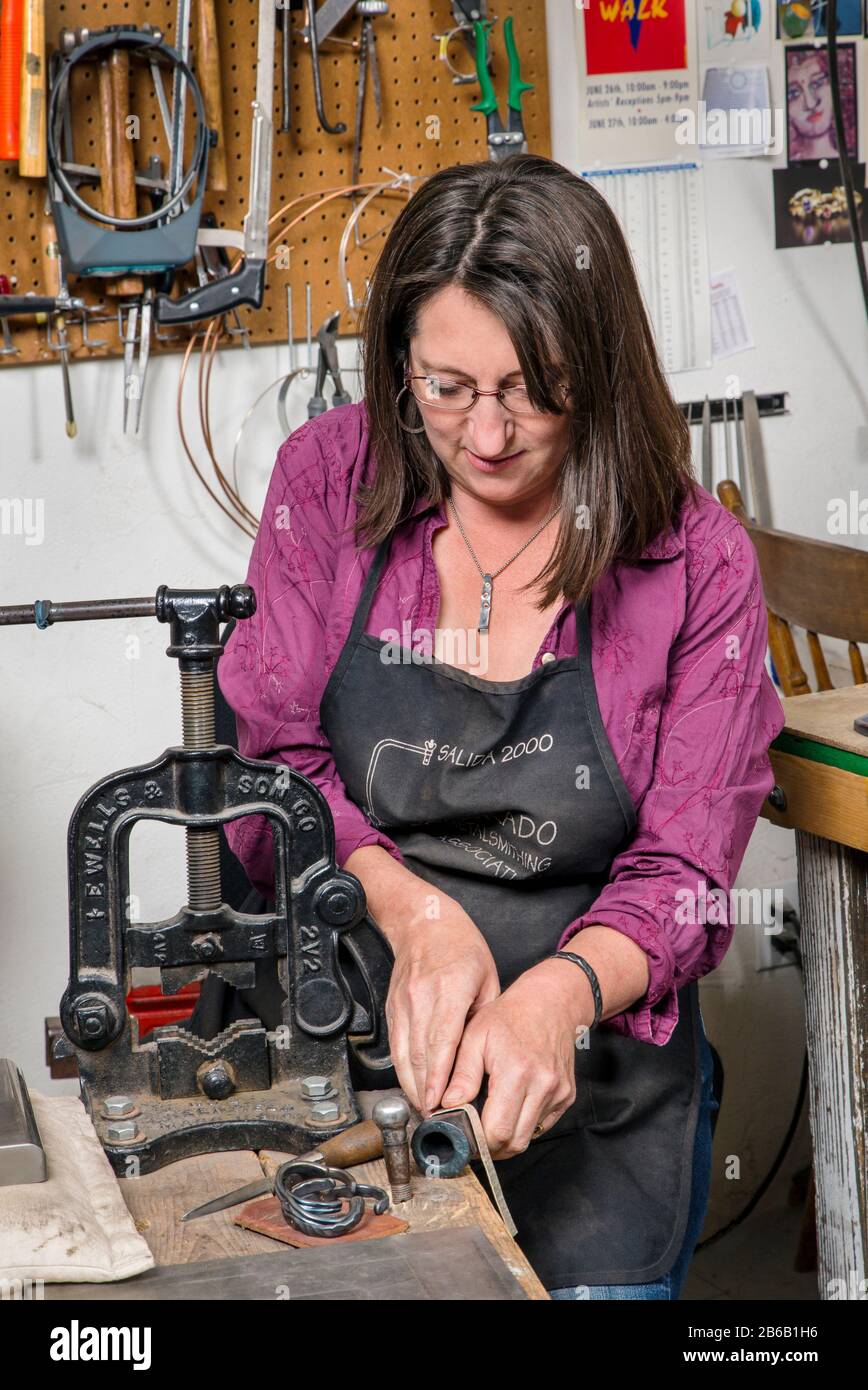 Artisans Nicole & Harry Hansen, Sterling & Steel, create original sterling silver and iron pieces Stock Photo