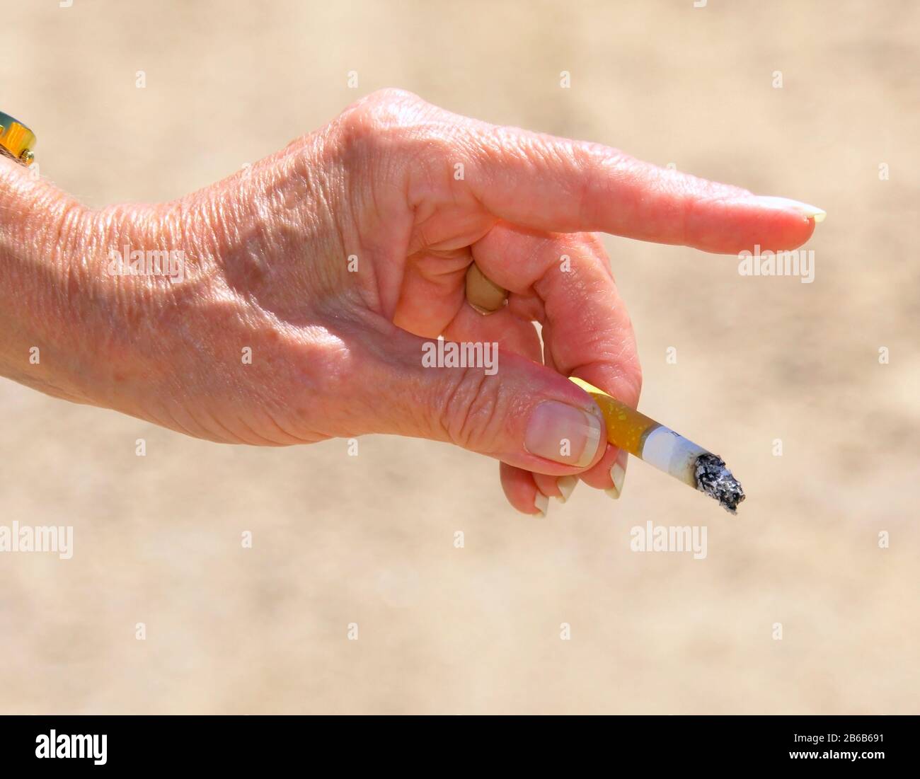 Closeup cigarette end burning hi-res stock photography and images