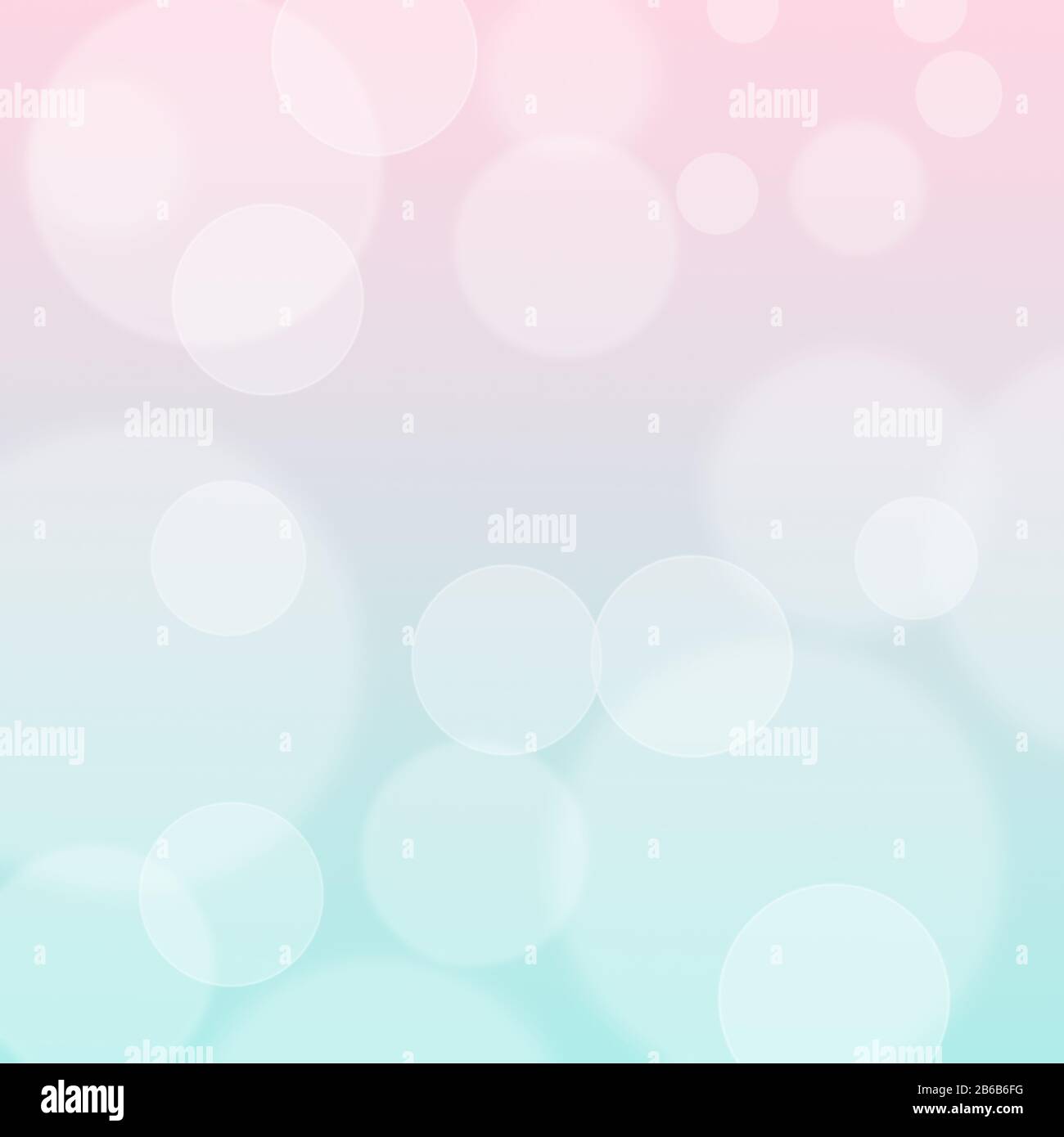white bokeh circles on blue and pink background Stock Photo
