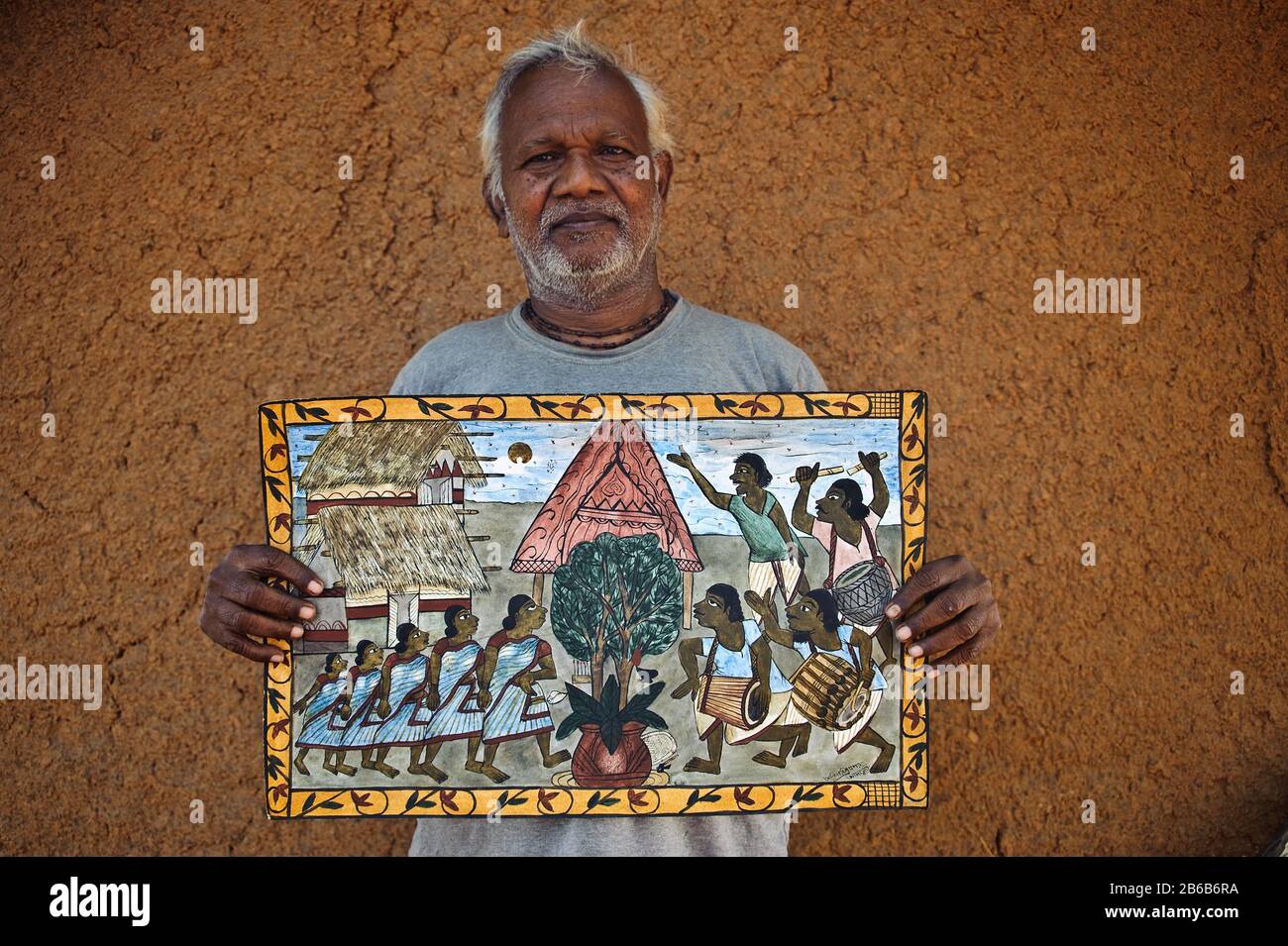 Pyatkar painter holding one of his paintings ( India) Stock Photo