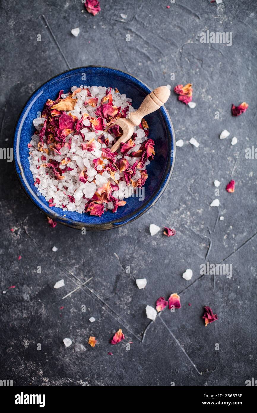 Bath salt with pink dried rose petals Stock Photo - Alamy