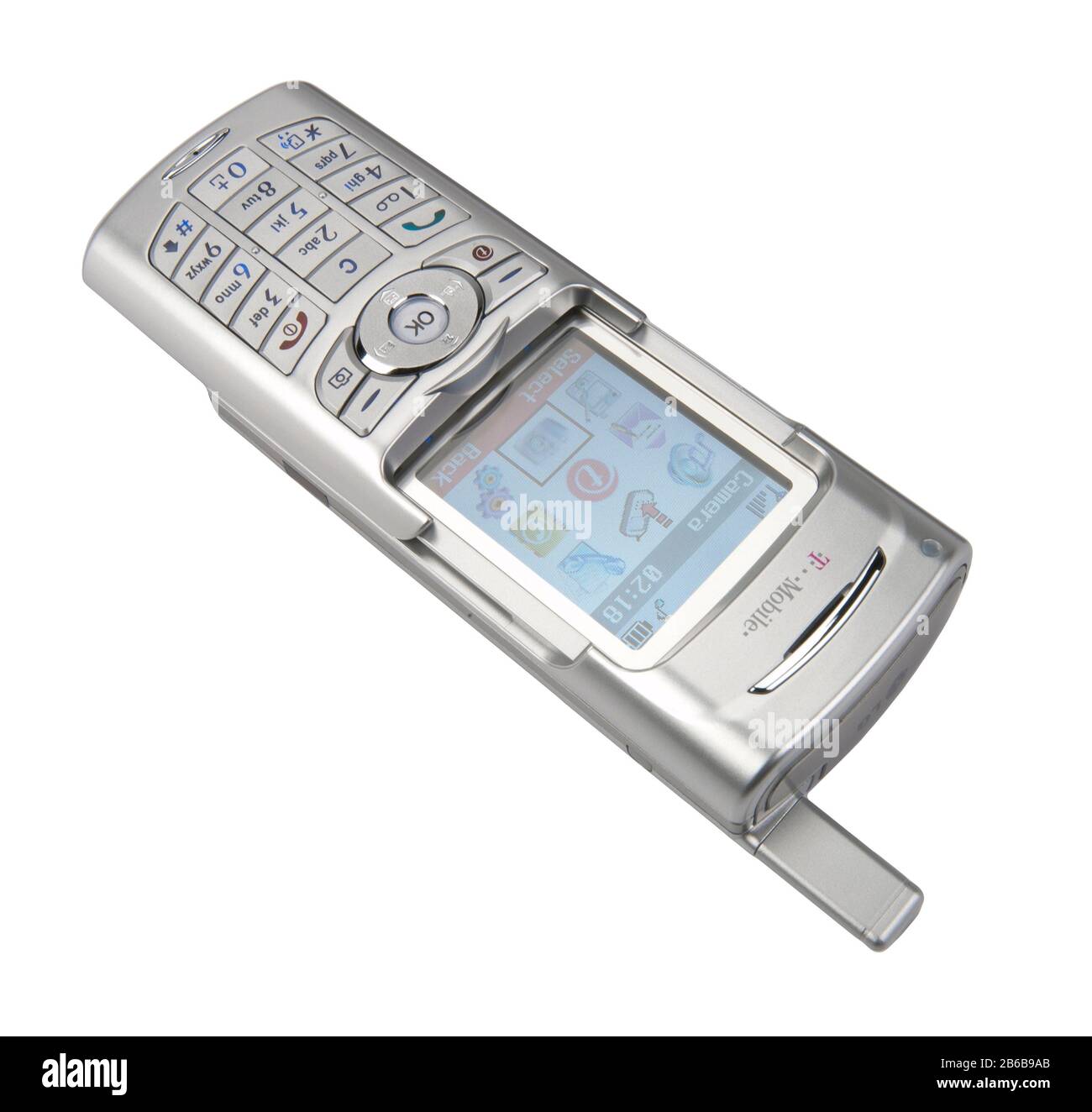 Old style 1990's mobile phone. LG Mobile telephone with colour screen on T mobile. Stock Photo