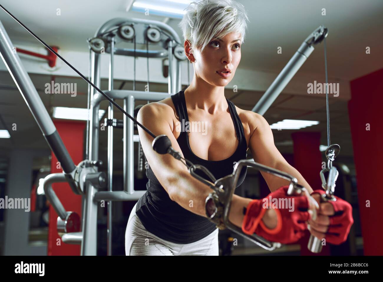Conviction focused determined passionate confident powerful eyes stare intense athlete exercise trainer Stock Photo