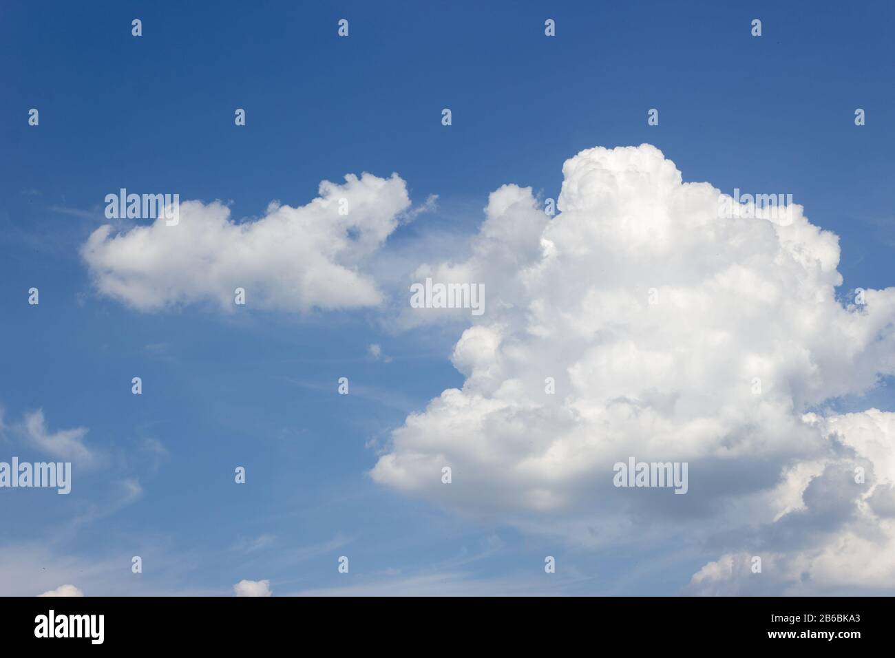 Curly clouds hi-res stock photography and images - Alamy