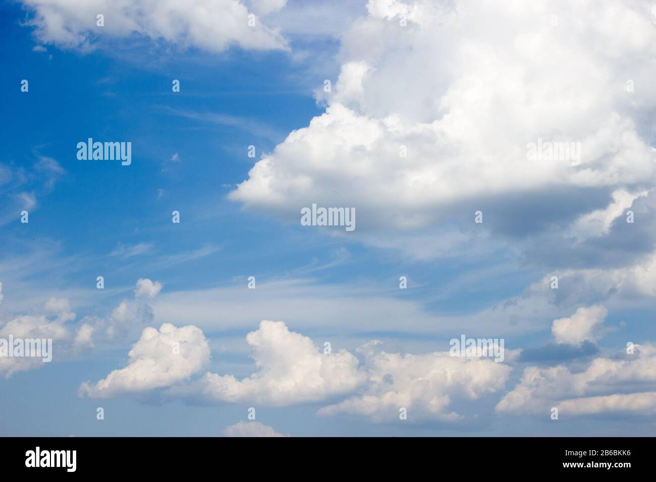 Curly clouds hi-res stock photography and images - Alamy