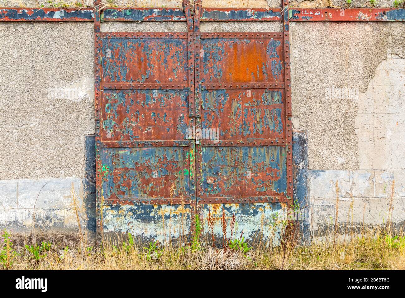rusted iron factory doorway Wirral August 2019 Stock Photo