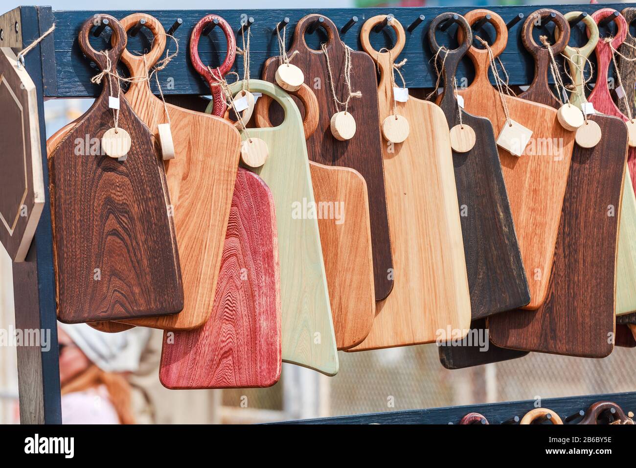 A range of hand made wooden chopping boards for sale Stock Photo