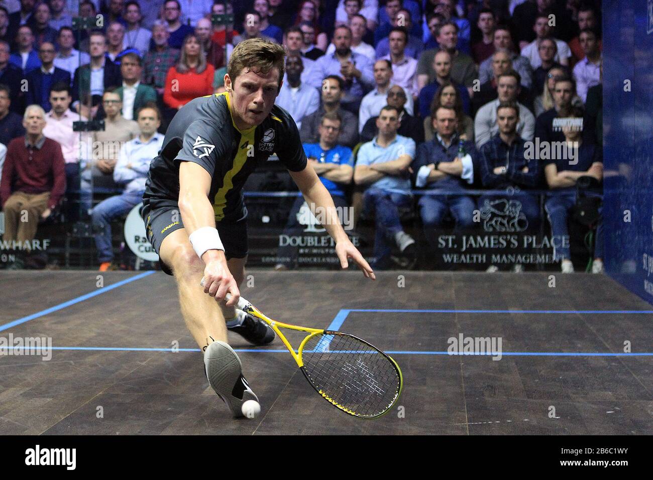 London, UK. 10th Mar, 2020. Greg Lobban of Scotland in action against Karim Abdel Gawad of Egypt. Canary Wharf Classic 2020 Squash, day 3 at the East Wintergarden in Canary Wharf, London on Tuesday 10th March 2020 pic by Steffan Bowen/Andrew Orchard sports photography/Alamy Live news Credit: Andrew Orchard sports photography/Alamy Live News Stock Photo