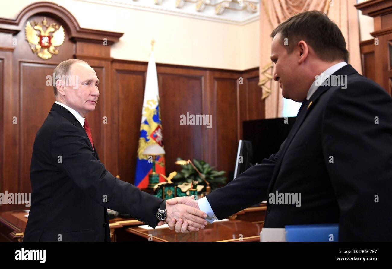 Moscow, Russia. 10th Mar, 2020. Russian President Vladimir Putin shakes hands with Novgorod Region Governor Andrei Nikitin before the start of a bilateral meeting at the Kremlin March 10, 2020 in Moscow, Russia. Credit: Alexei Nikolsky/Kremlin Pool/Alamy Live News Stock Photo